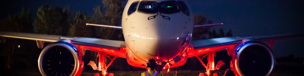 Plane lit up at night 